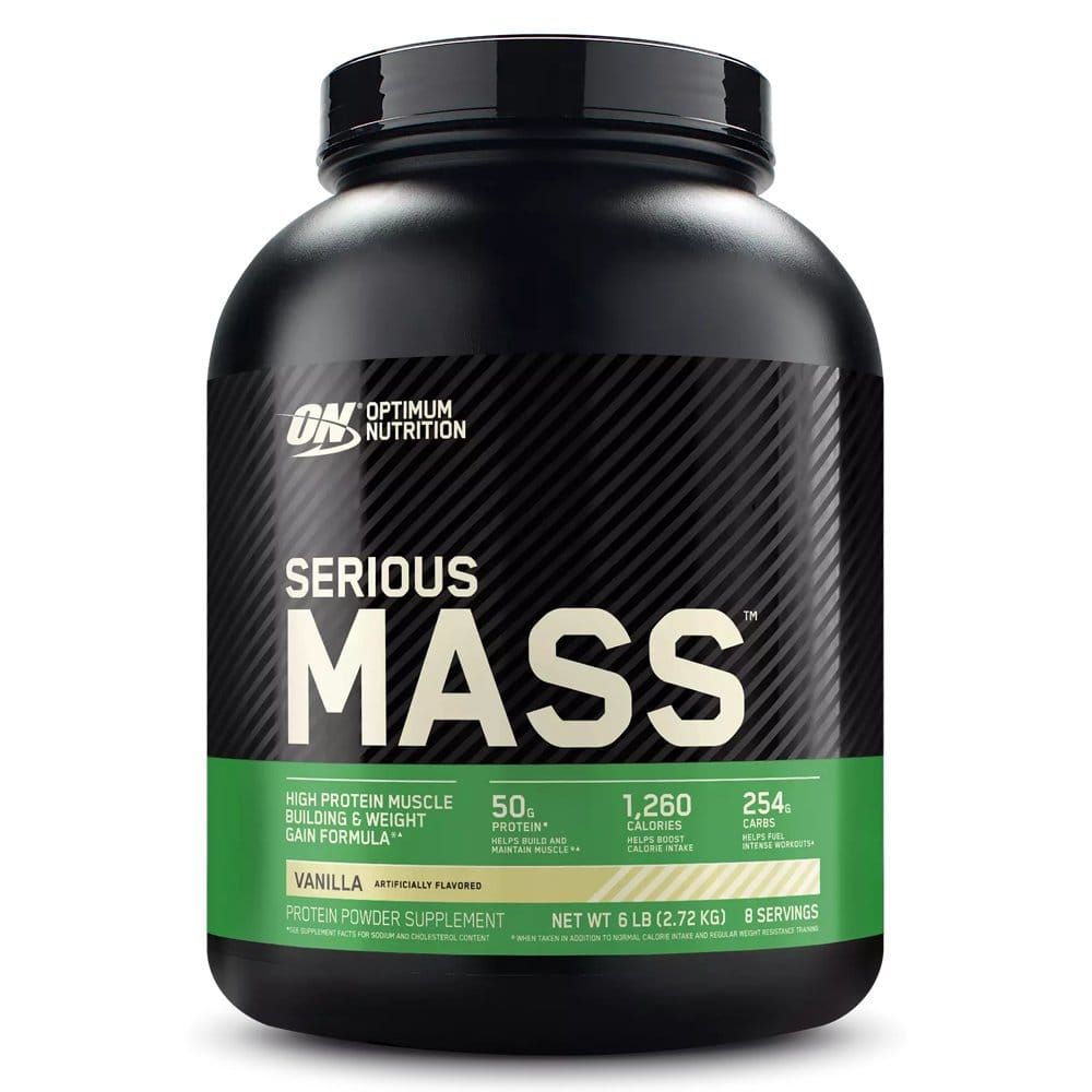 Frasco negro de suplemento proteico con la etiqueta “Serious Mass” y una banda verde sobre fondo oscuro.