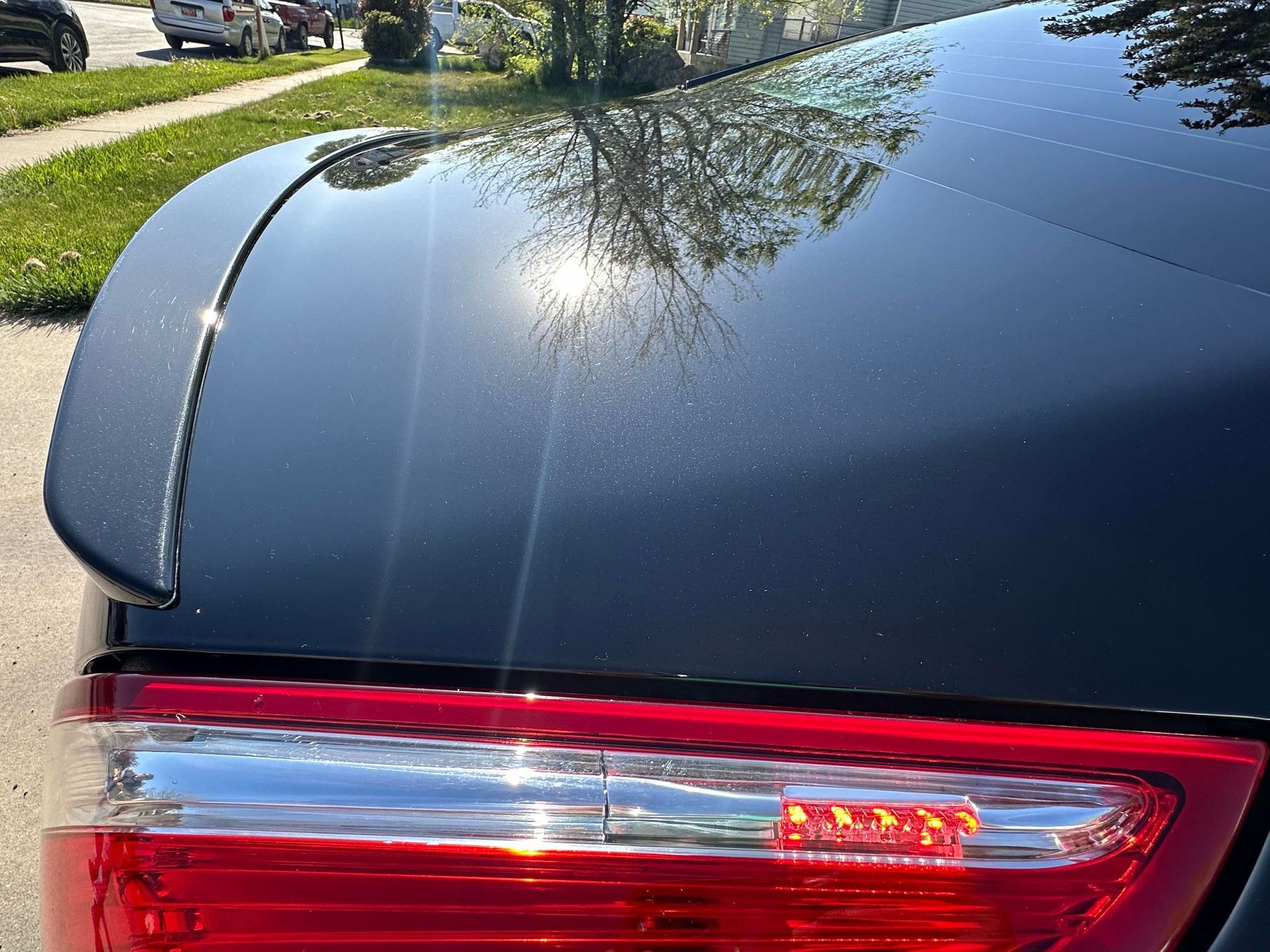 Side-by-side comparison of uncorrected paint vs corrected paint with ceramic coating