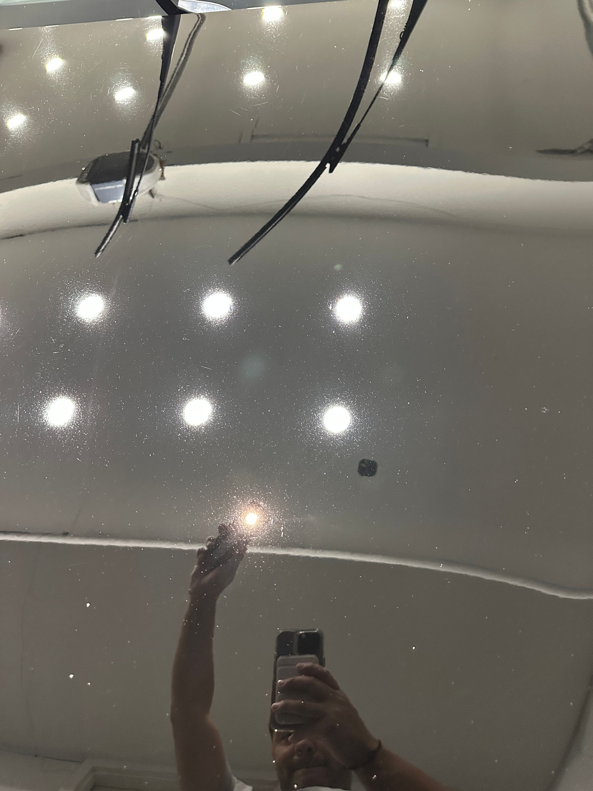 After: Dark sedan with flawless paint