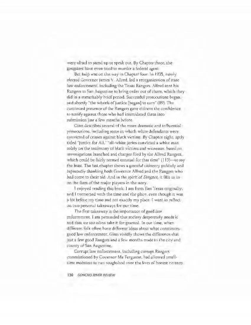 Blurry scanned page of dense black text on a white background