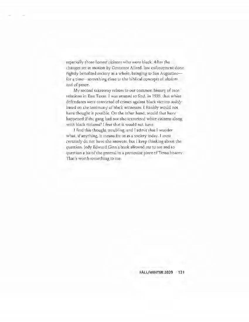Blurry white page with a small centered block of text and a page number at the bottom right