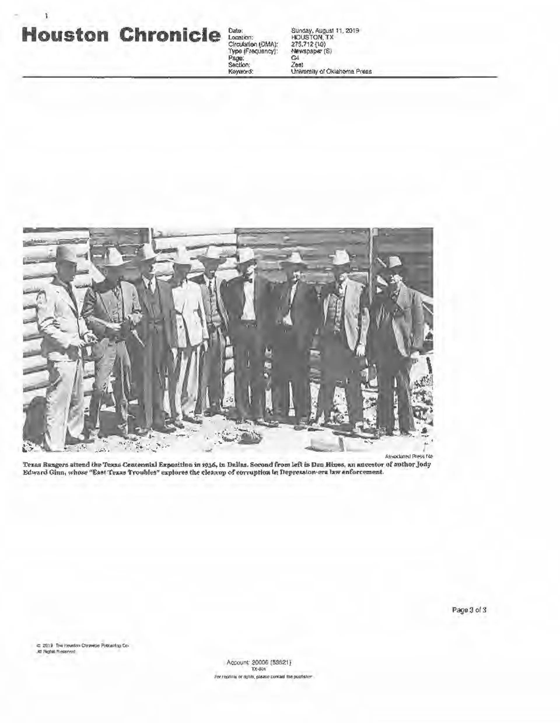 Newspaper clipping showing a group of people standing outdoors with a dog in the foreground