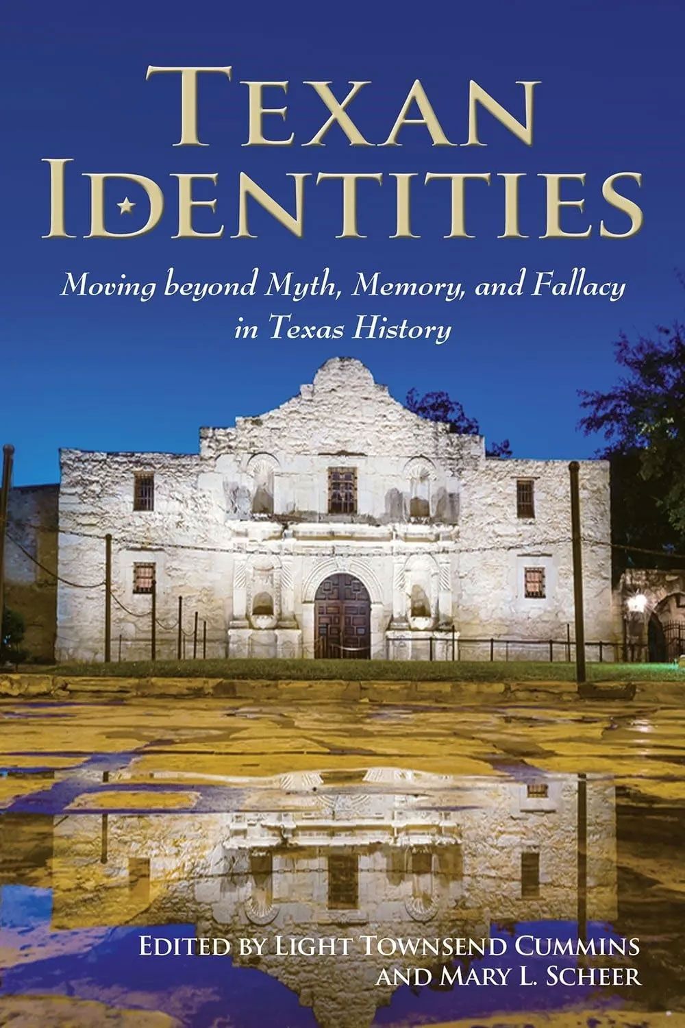 Book cover titled “Texan Identities” showing a historic white adobe-style building under a blue sky. Book cover titled “Texan Identities” showing a historic white adobe-style building under a blue sky.
