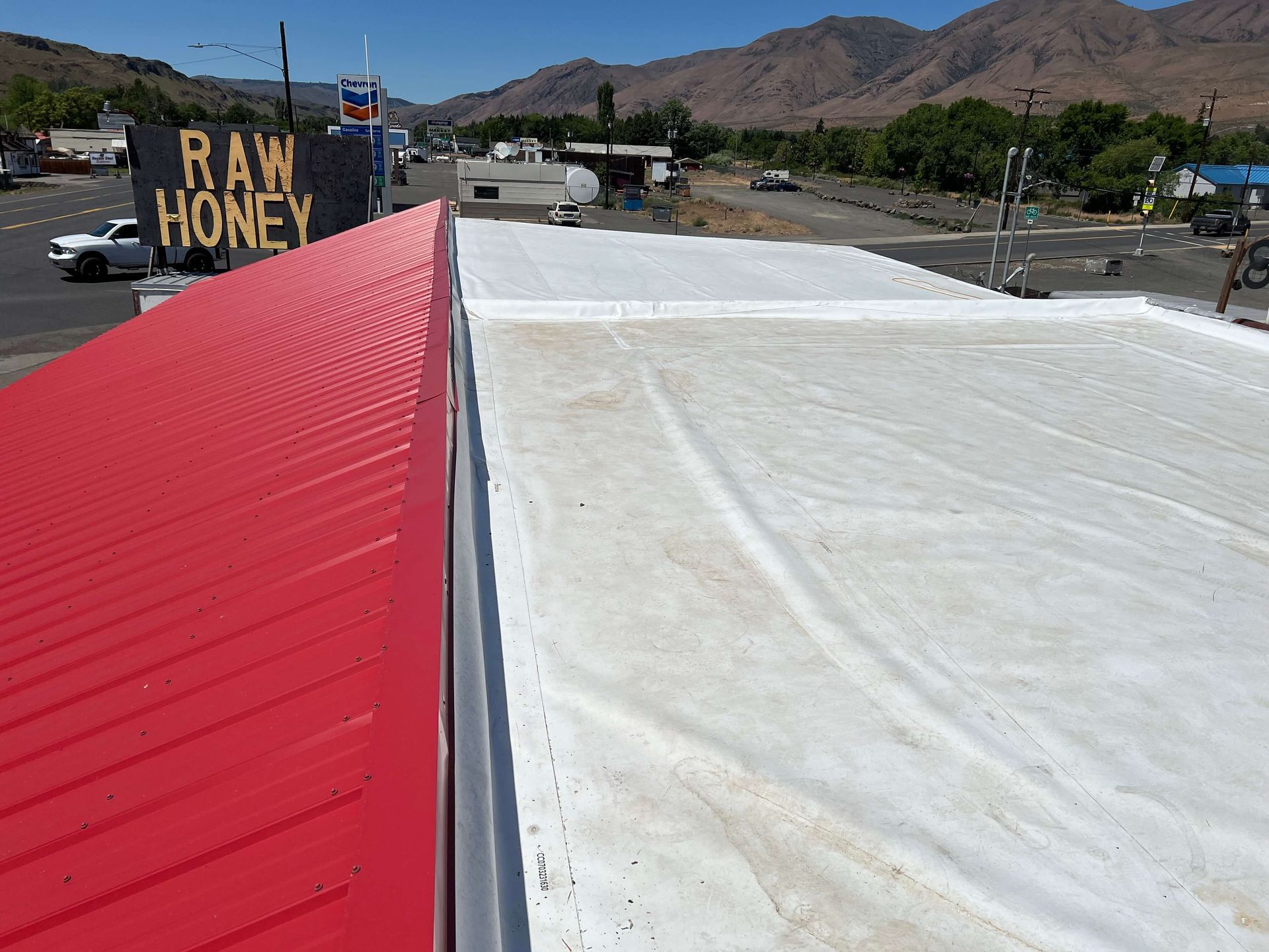 A photo showing our completed TPO Re-Roof on the Naches Fruit Stand
