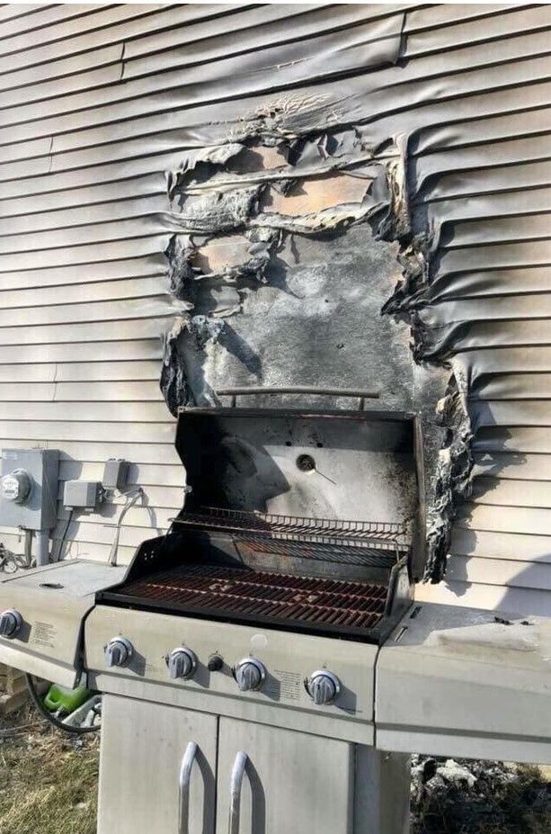 A photo of vinyl siding that has melted