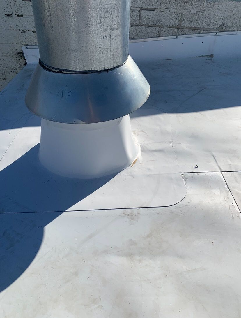 Close-up of penetration flashing detail on the TPO roof at Decco USA in Yakima, Washington.