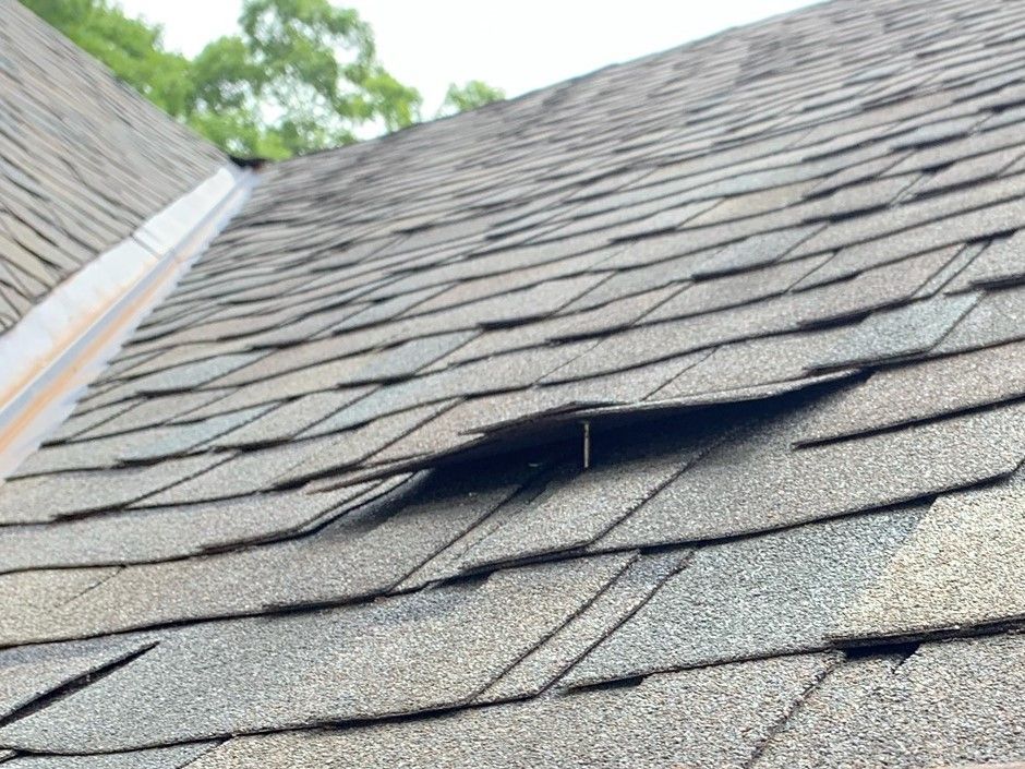 Improperly Driven Nail — Naches, WA — Yakima Roofing & Remodeling Improperly Driven Nail — Naches, WA — Yakima Roofing & Remodeling