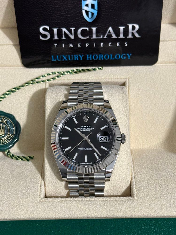 A sinclair timepieces luxury horology watch in a box