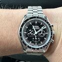 A person is wearing a watch on their wrist.