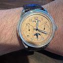 A person is wearing a watch on their wrist.