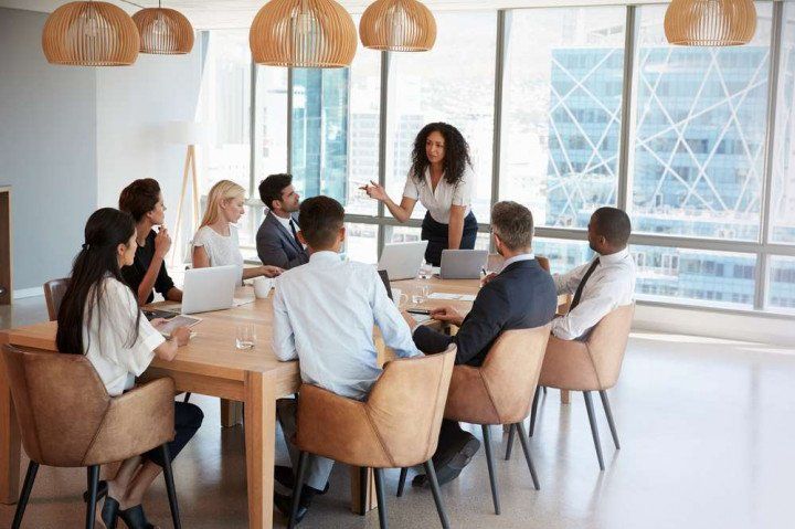 team of employees having a meeting