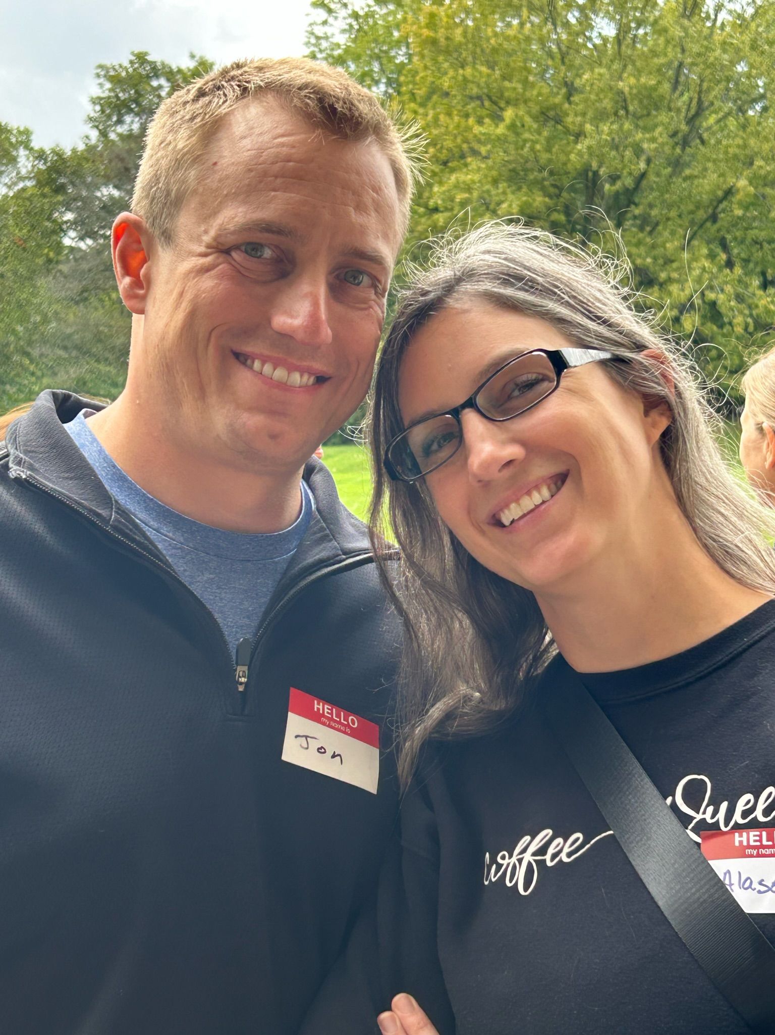 A man and a woman are posing for a picture together.