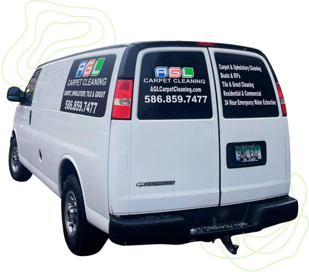 White HVAC van with company decals and phone number, rear three-quarter view