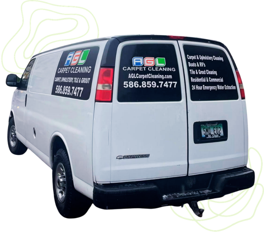 White HVAC van with company decals and phone number, rear three-quarter view