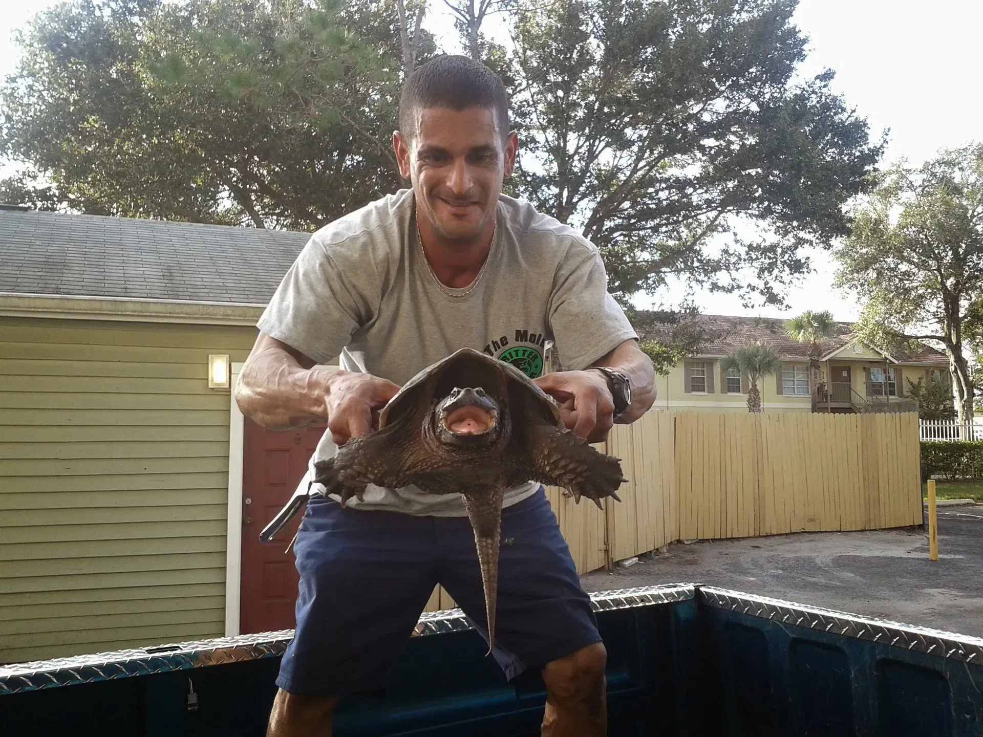 angel cortes holding a turtle