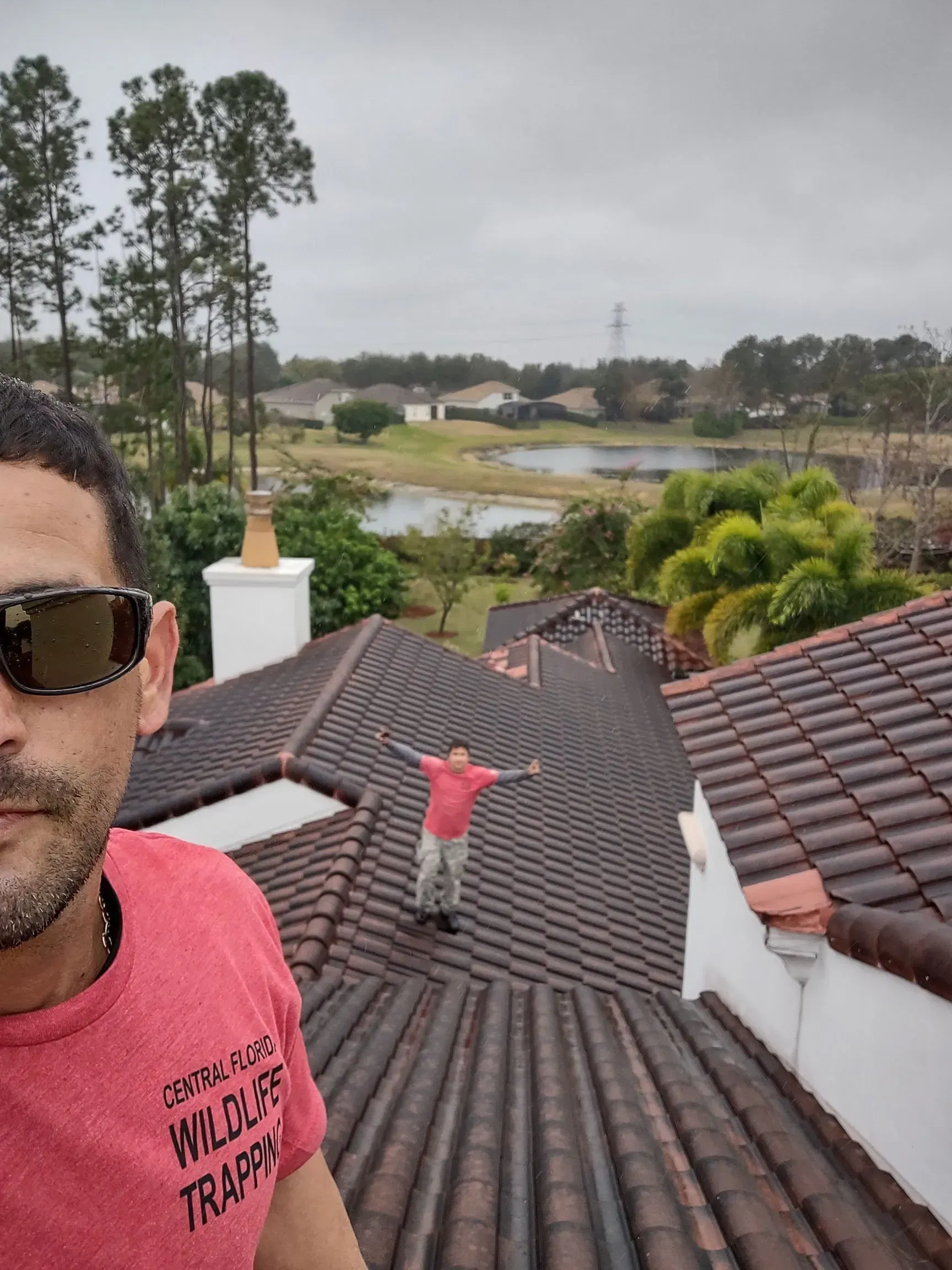 Edgar Nunez and Angel Cortes in a roof