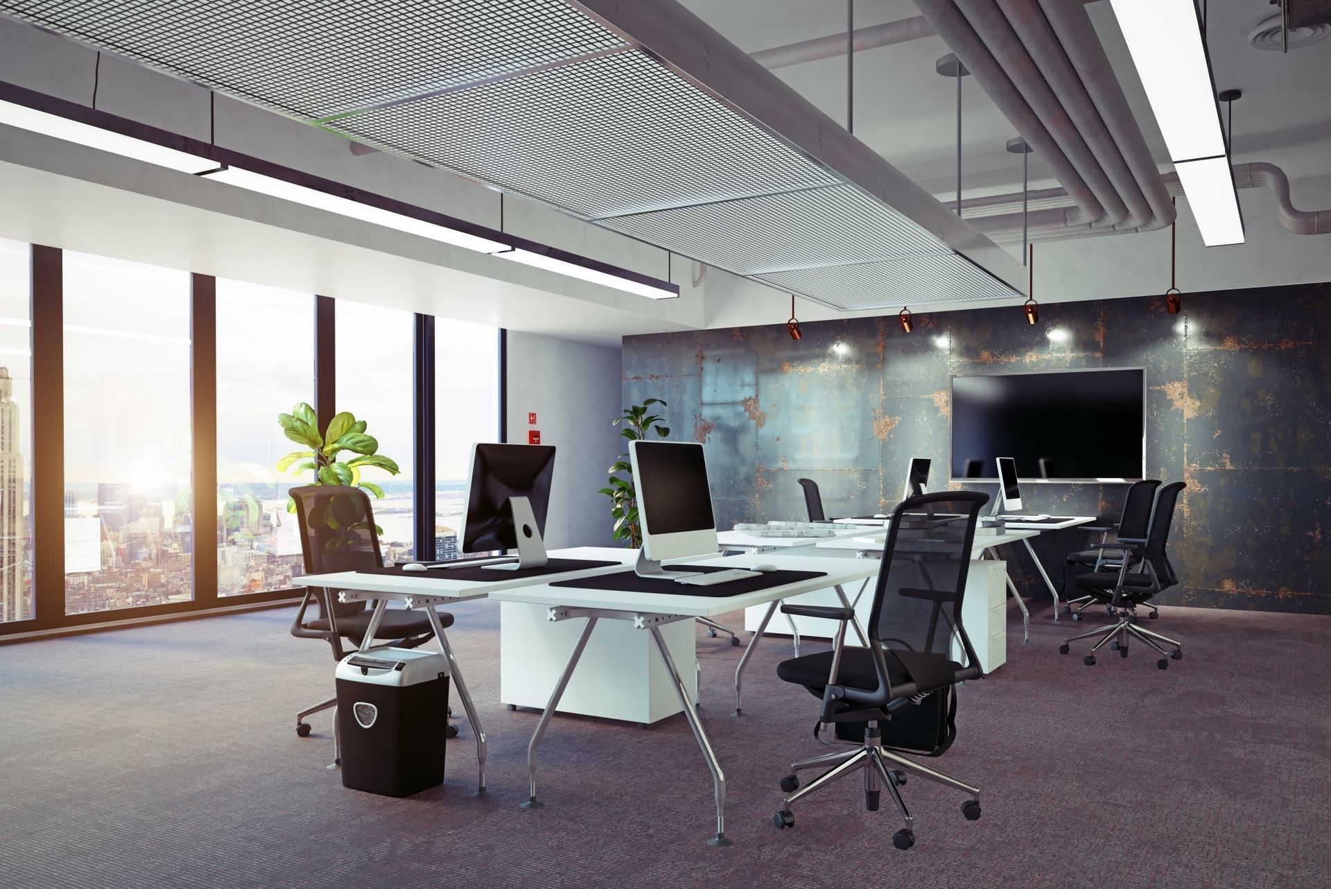 Un bureau avec beaucoup de bureaux, de chaises et d'ordinateurs.