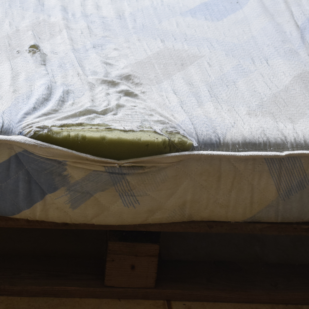 torn mattress