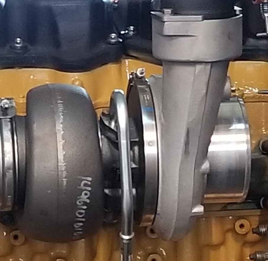 A close up of a car engine with a lot of gears