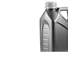 A close up of a bottle of oil on a white background. | Patterson Custom Diesel/Automotive