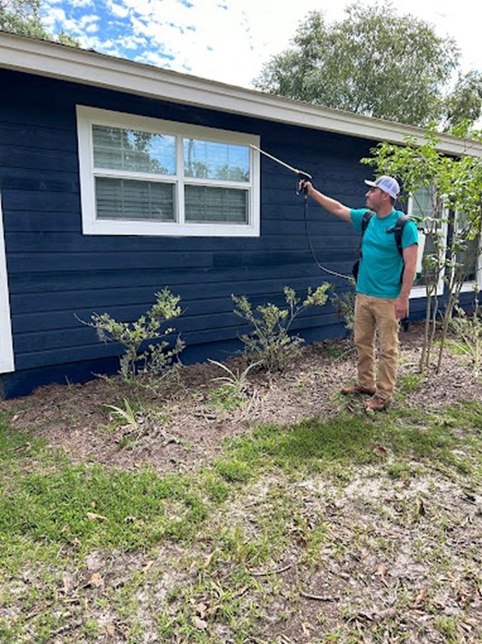 A Man is Spraying - Ridgeland, SC - Down South Pest Control