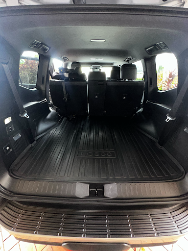 Interior of a Vehicle With Black Seats and a Cargo Mat — Mobile Club Cars Cairns in Earlville, QLD