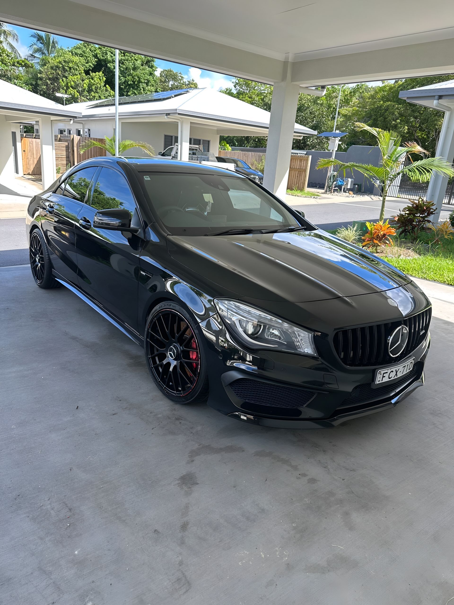 Black Mercedes Cla Coupe Parked Under a Carport — Mobile Club Cars Cairns in Earlville, QLD