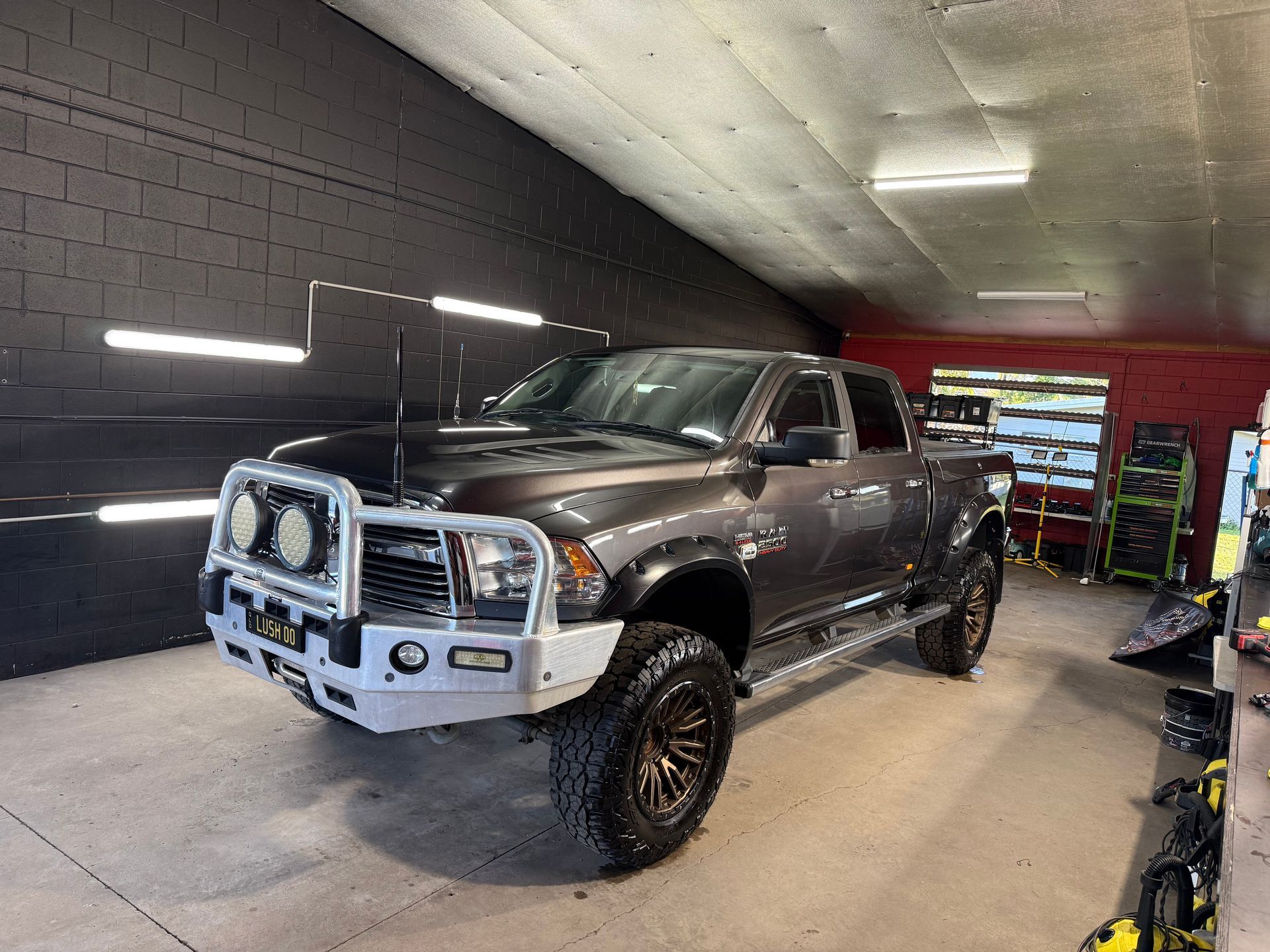 Gray Pickup Truck with Bull Bar Parked in A Garage — Mobile Club Cars Cairns in Earlville, QLD