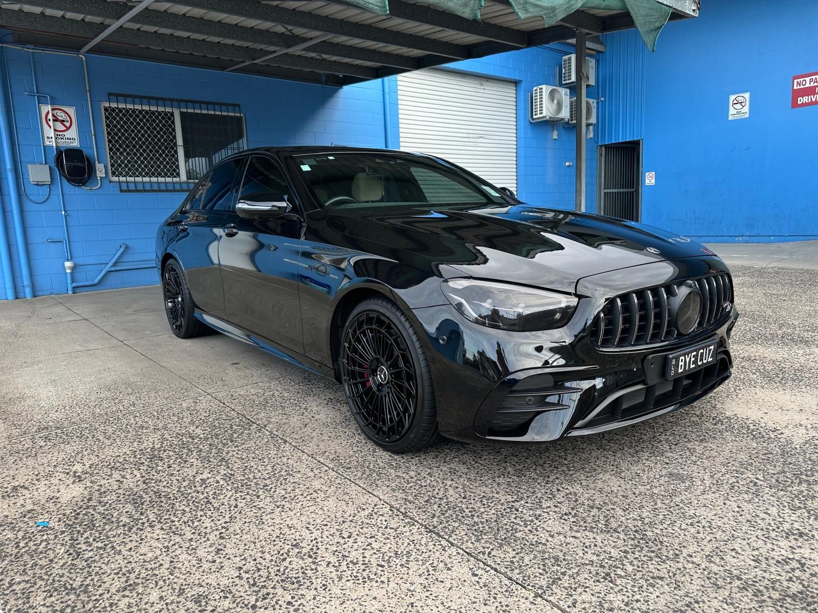 A Black Mercedes Benz Sedan Parked on a Gravel Surface — Mobile Club Cars Cairns in Earlville, QLD