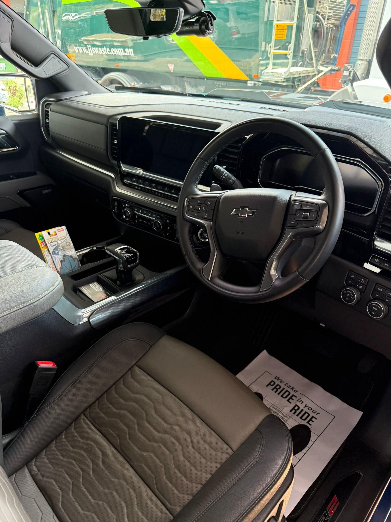 Interior View of a Modern Vehicle With a Black Leather Steering Wheel — Mobile Club Cars Cairns in Babinda, QLD