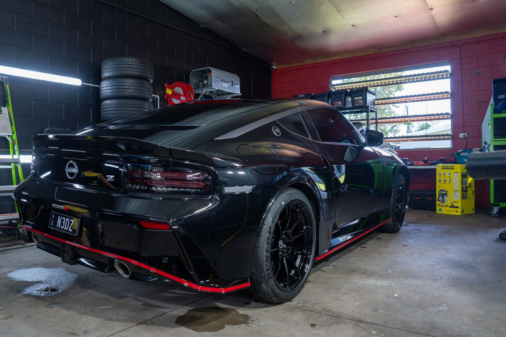 Black Sports Car in A Garage — Mobile Club Cars Cairns in Earlville, QLD