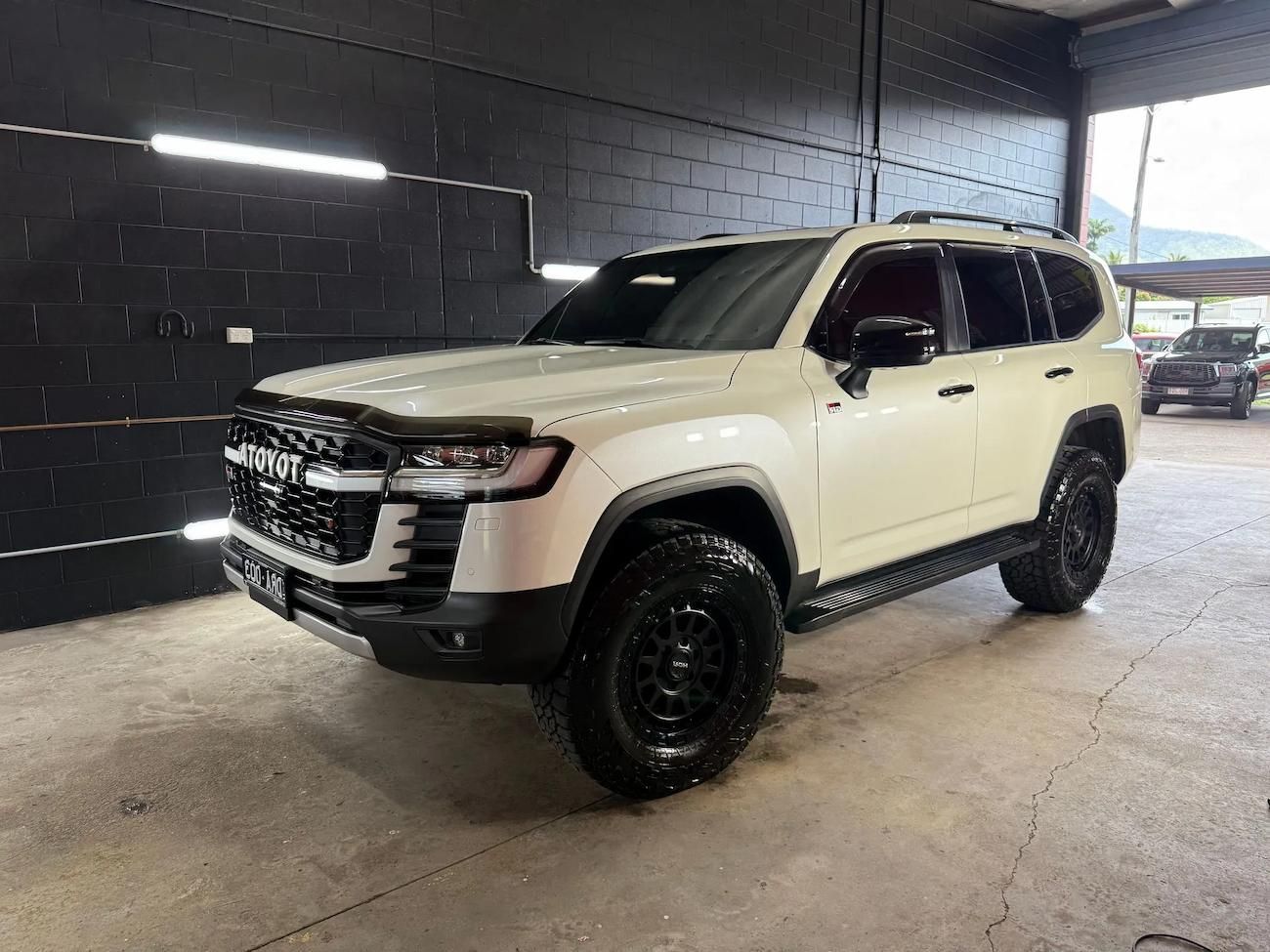 White SUV Showcasing Ceramic Coating In Cairns