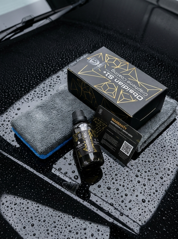 Black Boxes and A Small Bottle on A Wet Grey Car Seat — Mobile Club Cars Cairns in Earlville, QLD