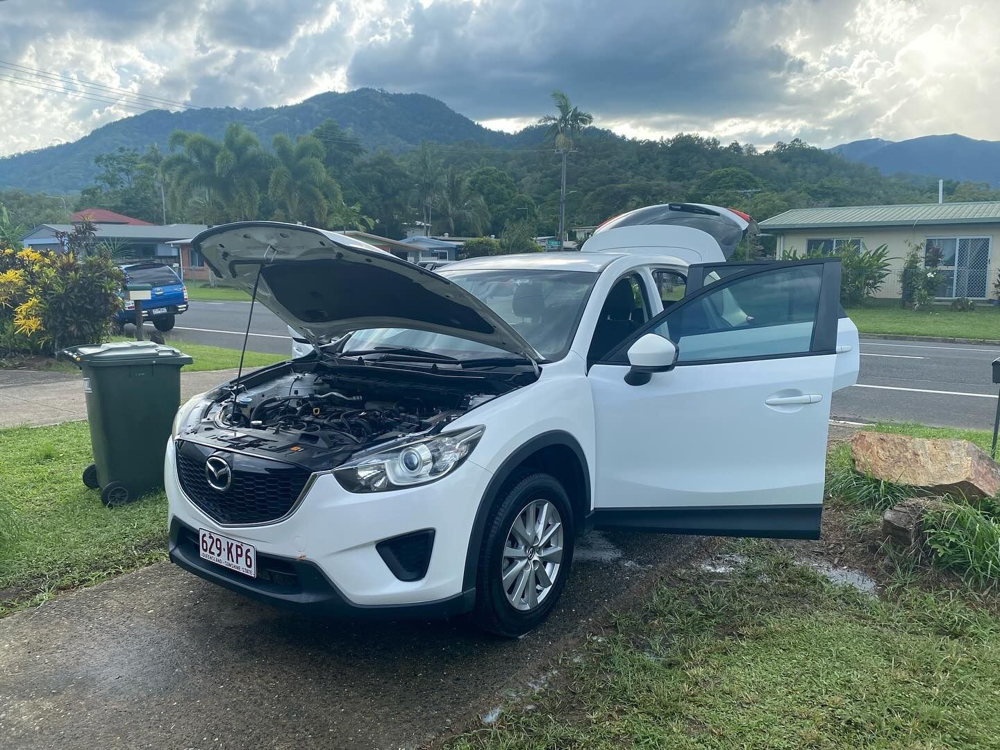 White Mazda SUV With Open Hood — Mobile Club Cars Cairns in Earlville, QLD