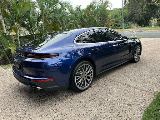 Blue Porsche Car Parked on a Paved Driveway — Mobile Club Cars Cairns in Earlville, QLD