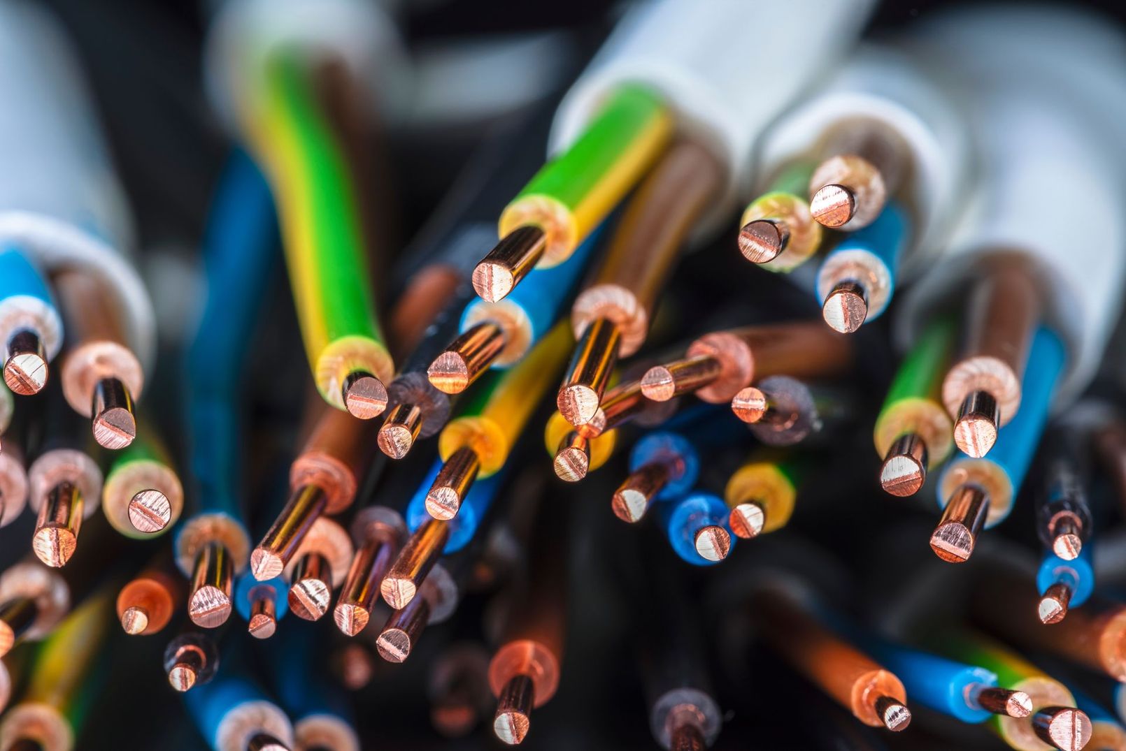 Close-up of colorful electrical wires with exposed copper ends