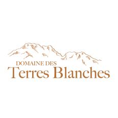 Een logo voor domaine des terres blanches met een berg op de achtergrond.