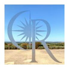 Een afbeelding van een letter r met een blauwe lucht op de achtergrond