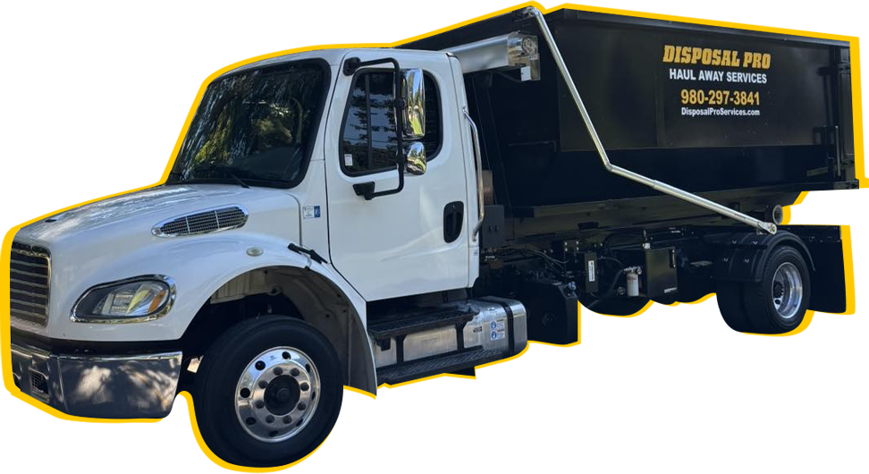 White dump truck with black bed and yellow company lettering on the side, isolated on white background