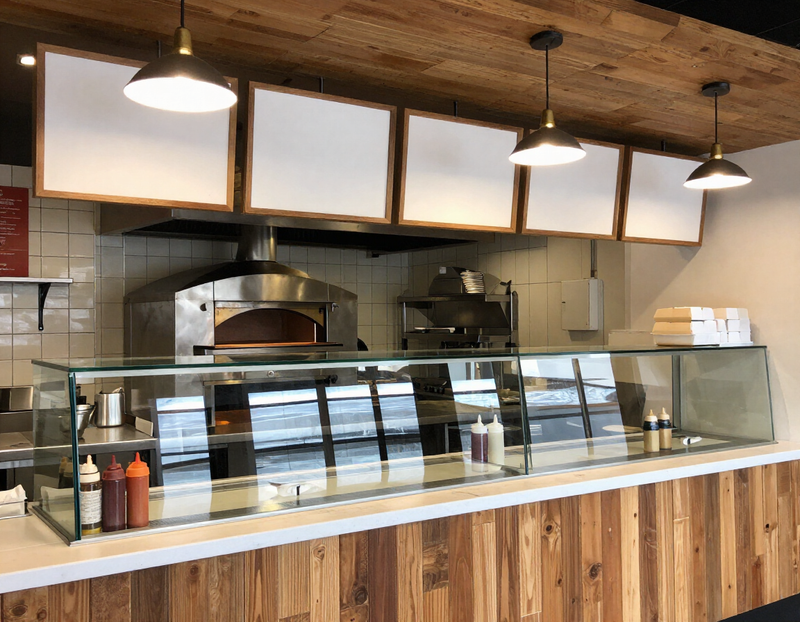 Inside of a pizza and sub shop