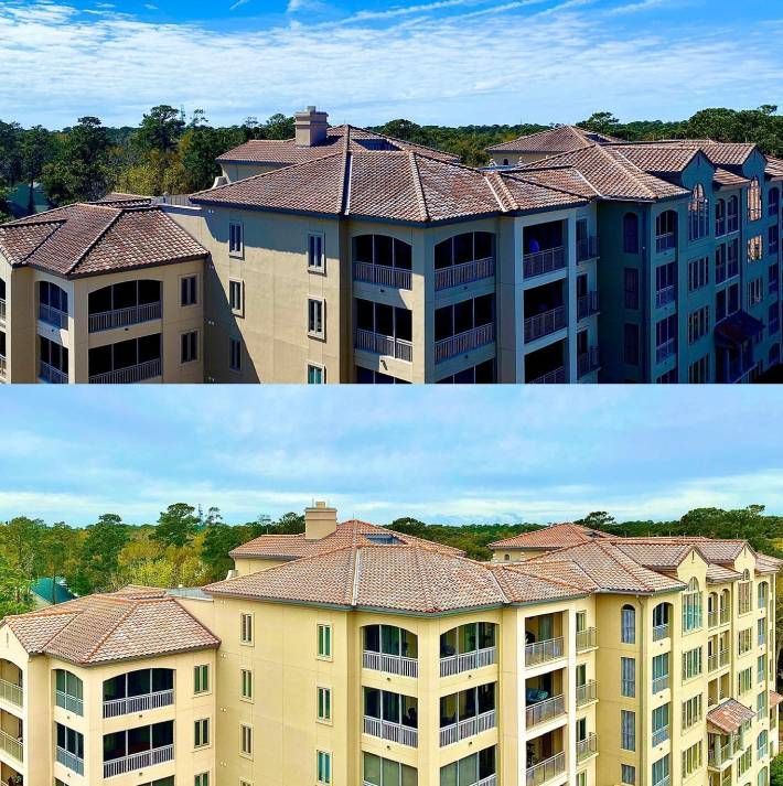 A large apartment building with a lot of windows and balconies