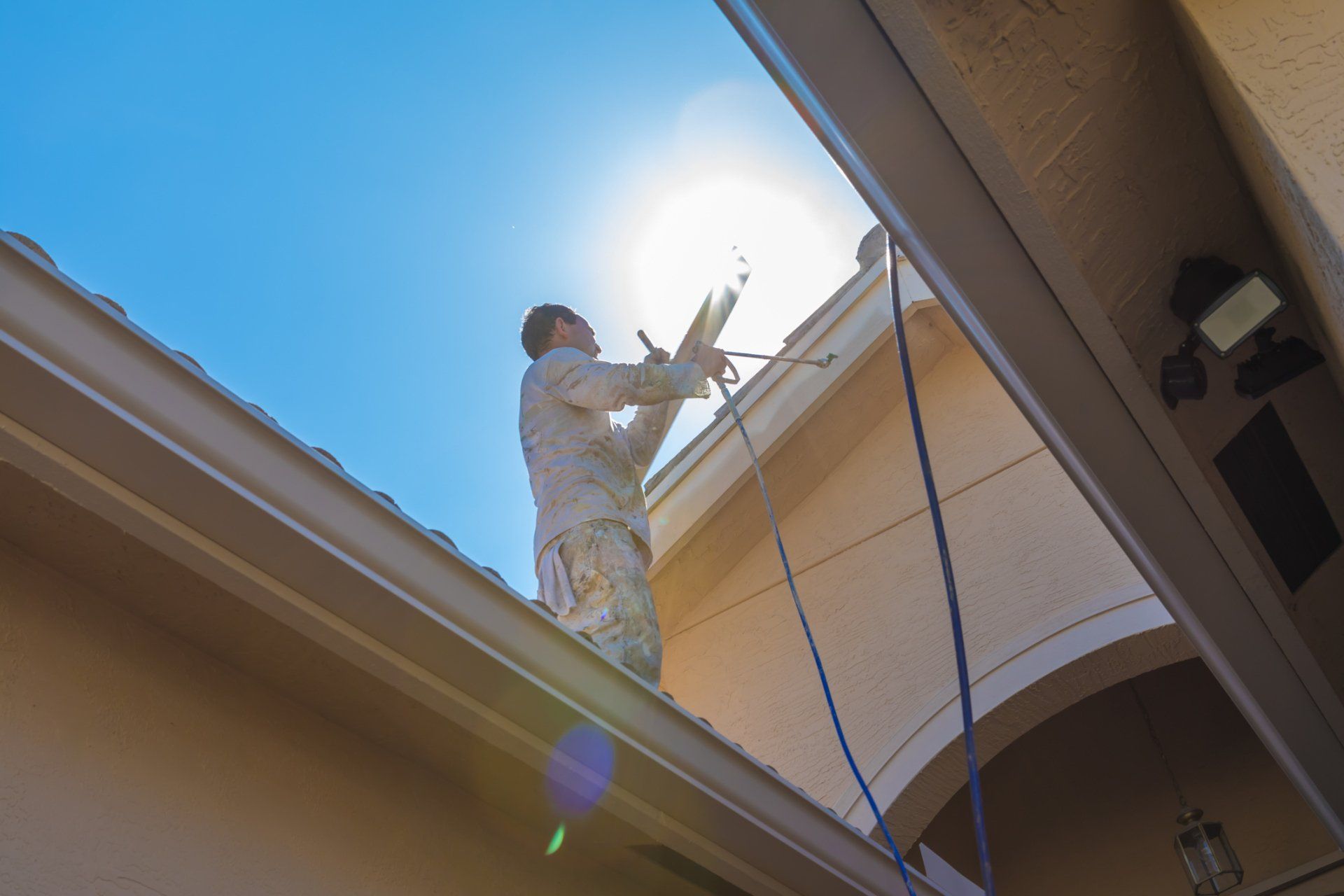 Man applying roof coating | Townsville, QLD | Roofshield Townsville