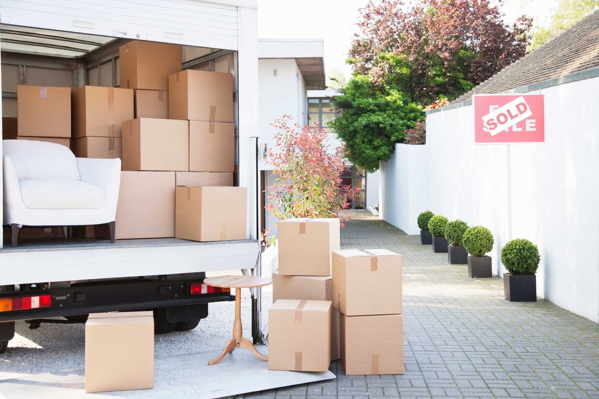 Boxes on Ground Near Moving Van — Columbus, OH — EZ Does It Moving and More