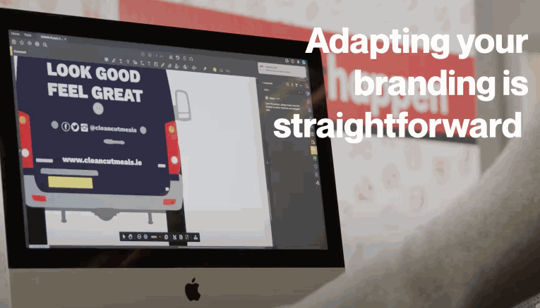 A computer screen displays a vehicle wrap design for Clean Cut Meals, showing the back of a van with the slogan “LOOK GOOD FEEL GREAT” and branding details