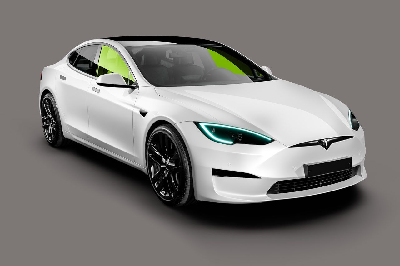 A white tesla model s with a green windshield on a gray background.