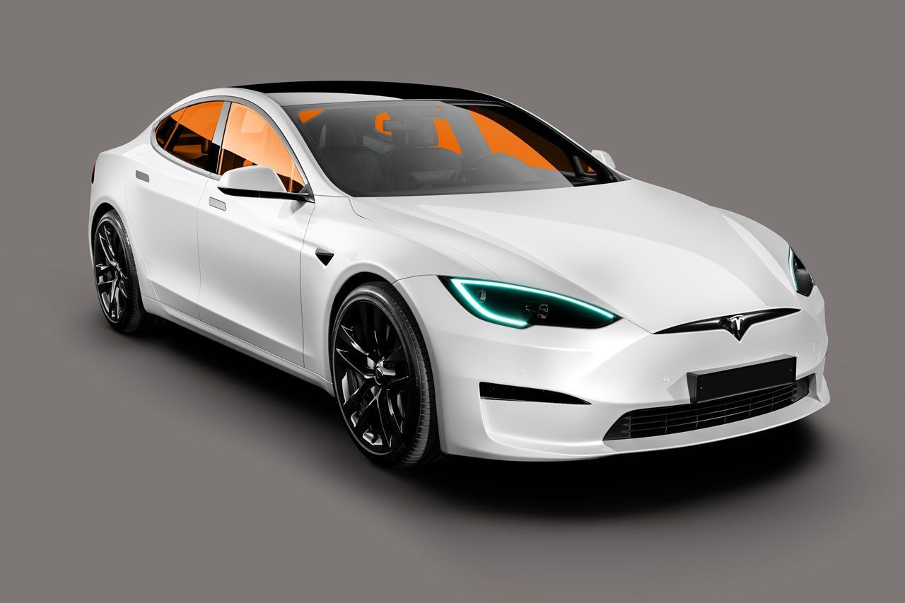 White Tesla Model S with black wheels, tinted windows, and a sleek, modern design against a grey background.