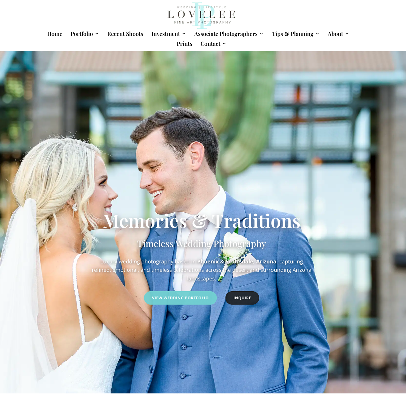 Bride and groom smiling at a wedding venue with greenery and glass doors behind them