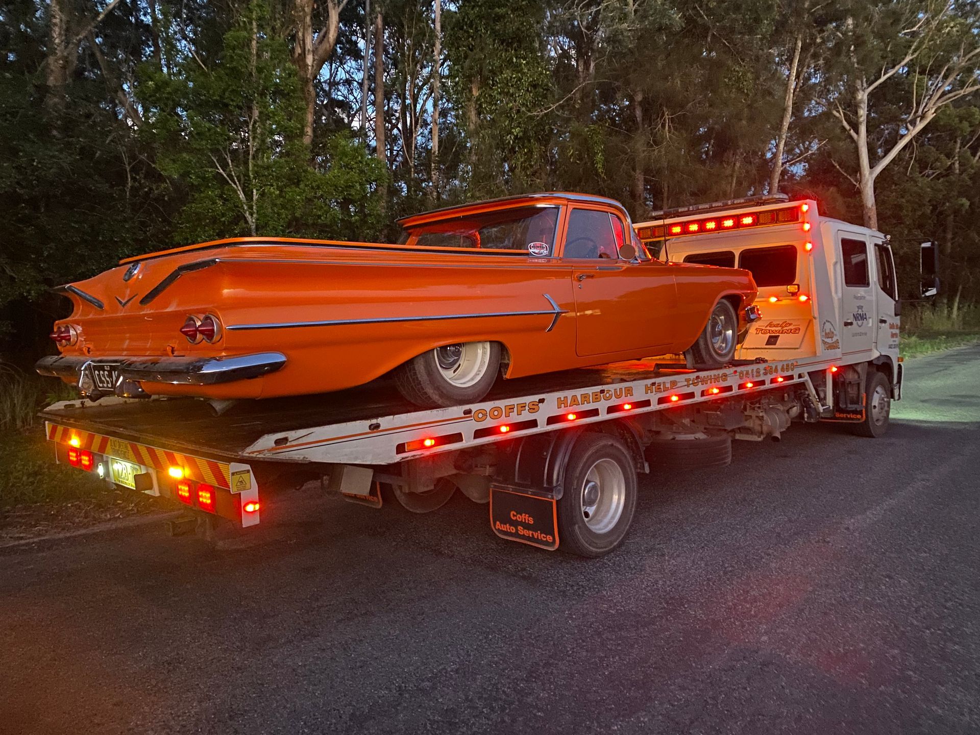 Orange Classic Car On A Flatbed Tow Truck — Coffs Tow Trucks In Nambucca Heads, NSW