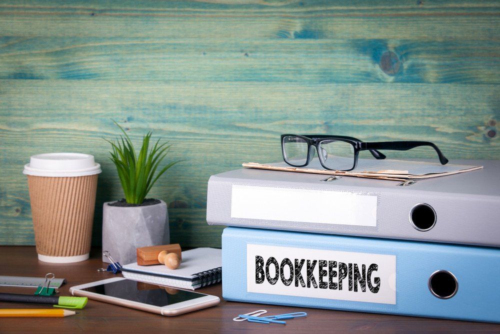 Bookkeeping Binders & Glasses — Bookkeepers in Bundaberg QLD
