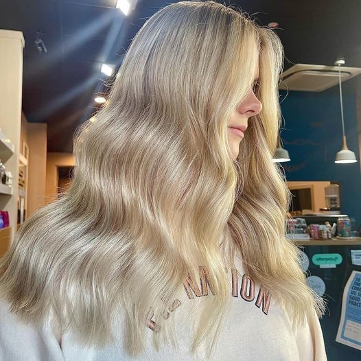 Woman With Long, Wavy Blonde Hair — Gina T Hair & Beauty In Mackay, QLD